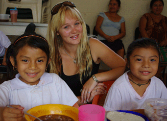 Meal time at the Maya Nutrition Center was great fun for MFIL volunteer Lahnee during her participation in our social work programs.